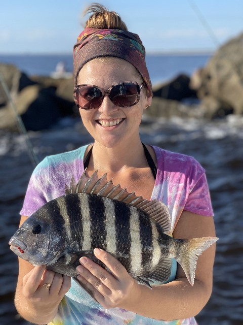 Smiling Woman Showing Her Catch