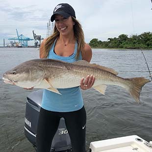 Woman Holding A Big Fish