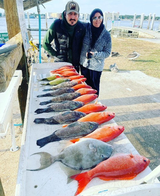 Couple With The Fishes Caught