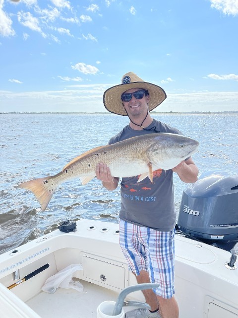 Man Holding A Big Fish